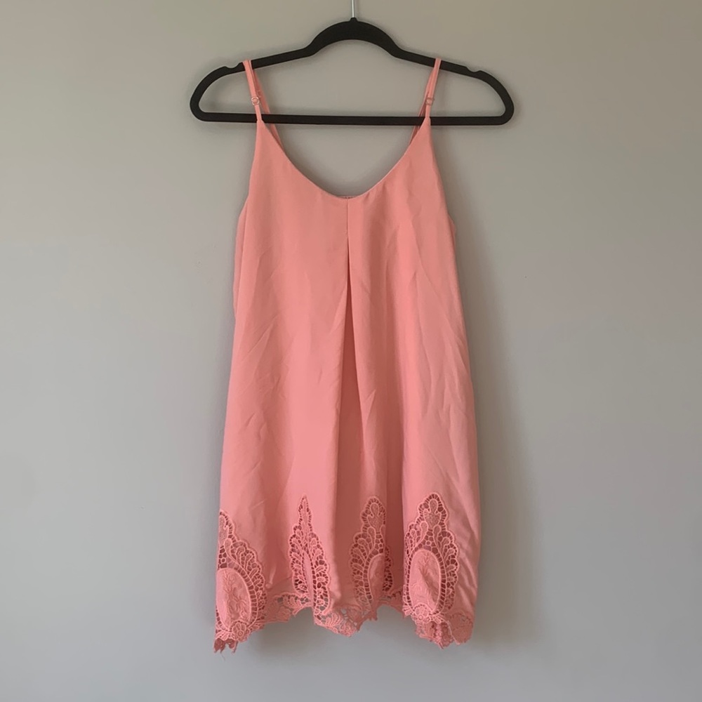 Coral dress with lace detailing